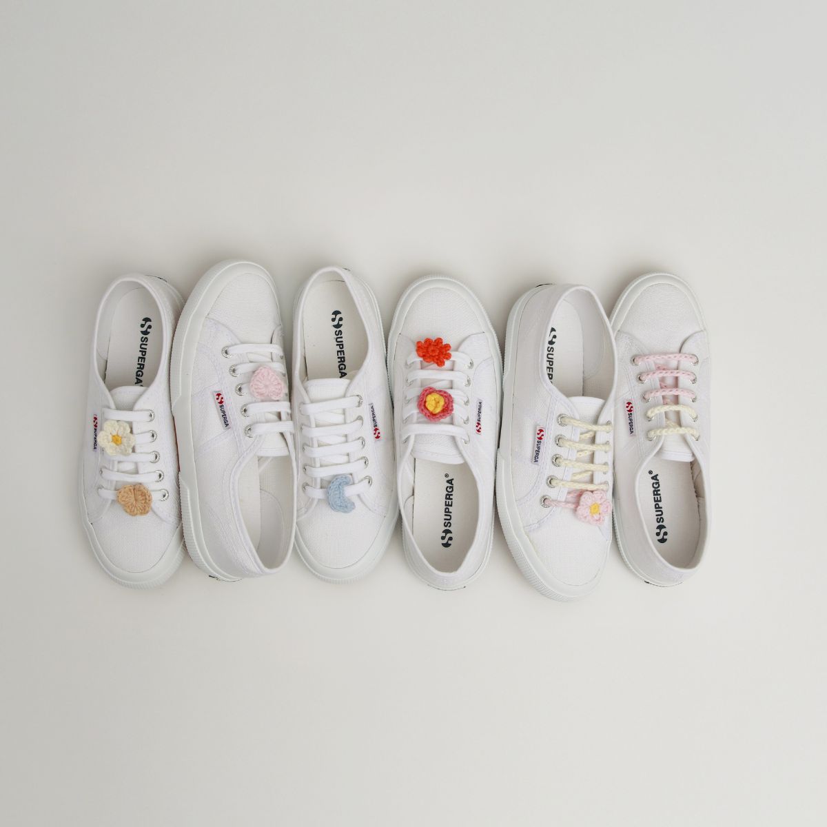 Superga: A fresh take on an icon The 2750 evolves with lace charms and summer-ready designs