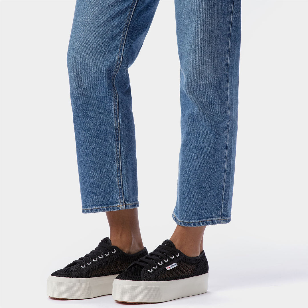 Sneakers con zeppa nere con tomaia in mesh main