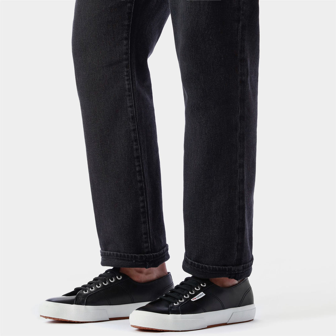 Zapatillas negras unisex con parte superior de piel napa main